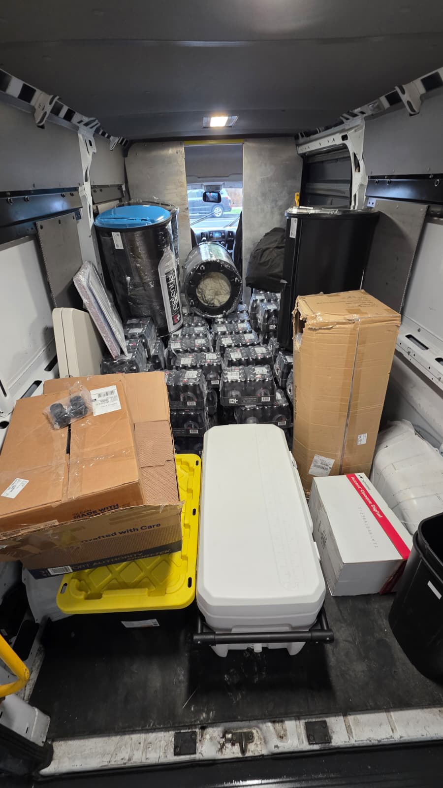 VanGo crew transporting event equipment to a venue in Virginia